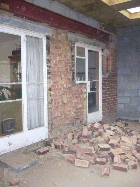 taking off the outer skin of bricks