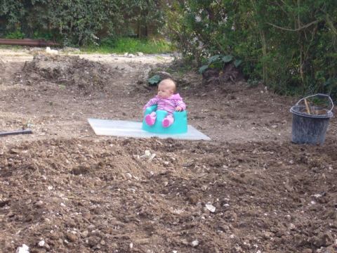 work overseer looks on - hard to tell if she's impressed..