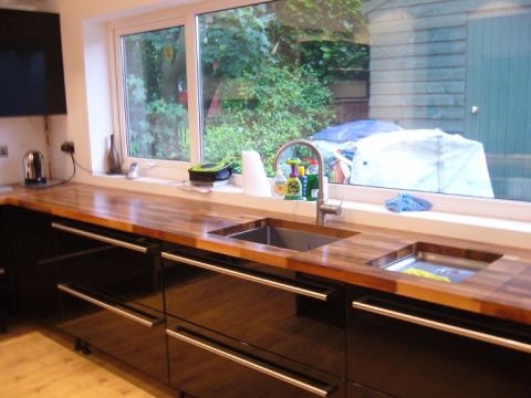 Worktop even matches up with the sinks (am glad I let them cut it)