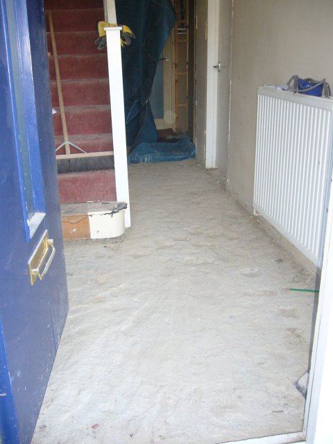 screed in hall chipped up to make way for underfloor heating