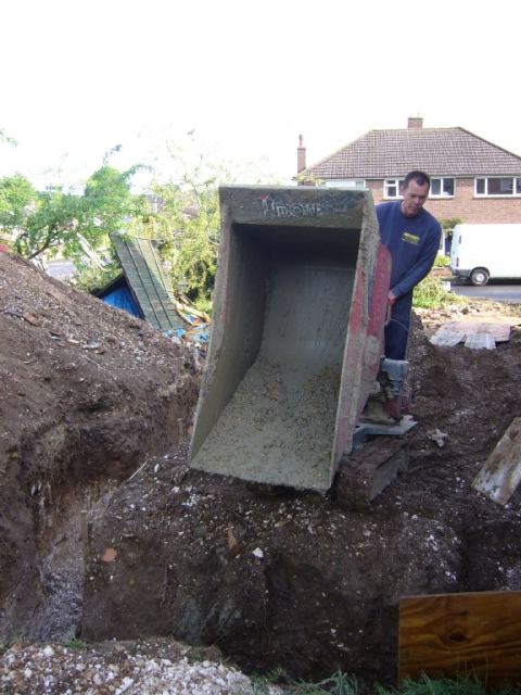 uses his own mini dumper instead..