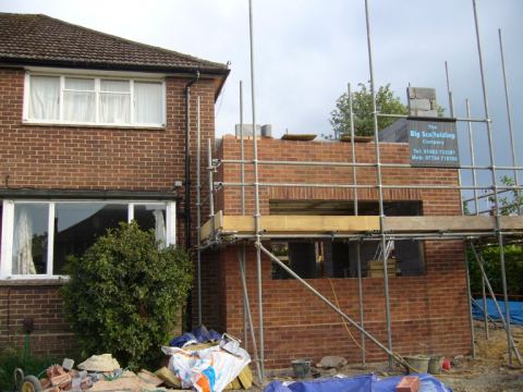 being forward of the rest of the house and the fact that the land drops away to the front and right makes this seem very high..