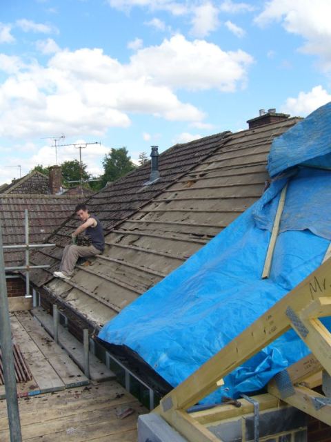 Drafted in the nephew to strip the old stuff off the front while we work on the new at the back