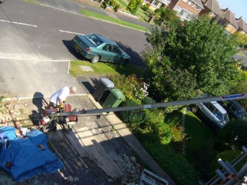 Recruited some help.. chris helps me load the tiles on the hoist