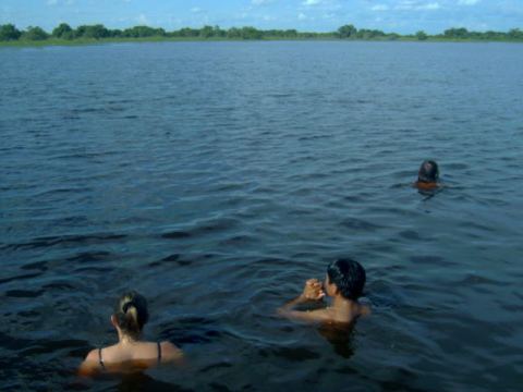 Dorio (the guide) tries to attract the dolphins